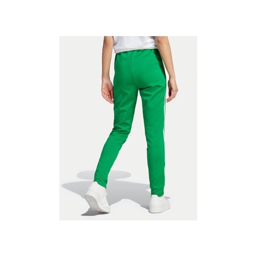 adidas Spodnie dresowe adicolor SST IK6601 Zielony Slim Fit XS MODIVO