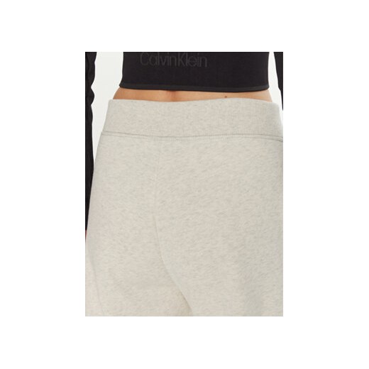 Calvin Klein Jeans Spodnie dresowe Monologo J20J223590 Szary Relaxed Fit S MODIVO