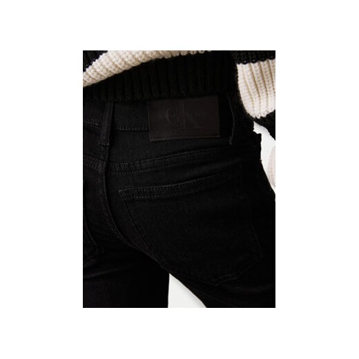 Calvin Klein Jeans Jeansy IG0IG02610 Czarny Flare Fit 16Y MODIVO