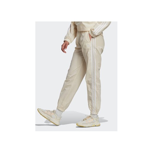 adidas Spodnie dresowe adicolor lassics Poplin Track HL9309 Écru Regular Fit 40 MODIVO