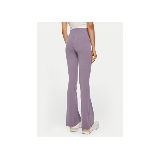 Nike Spodnie materiałowe FQ2113 Fioletowy Slim Fit Nike S MODIVO