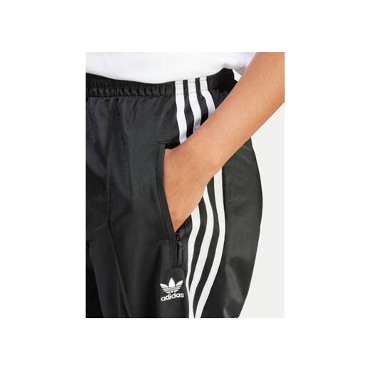adidas Spodnie dresowe Firebird IT7404 Czarny Regular Fit 2XL MODIVO