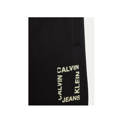 Calvin Klein Jeans Spodnie dresowe Mini Hero IB0IB02125 Czarny Relaxed Fit 10Y MODIVO