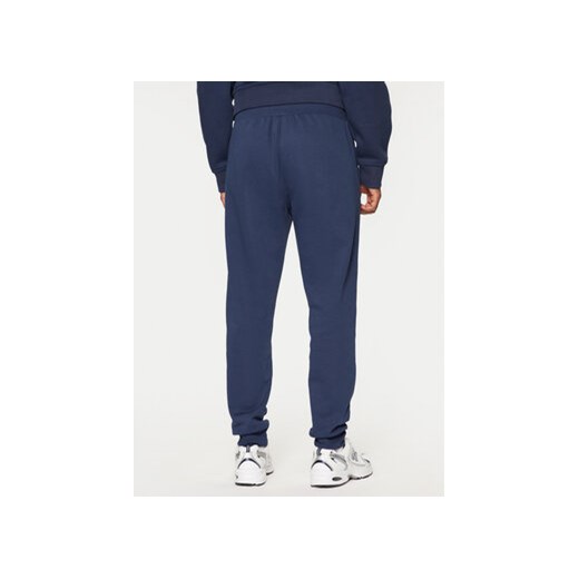 Champion Spodnie dresowe 220314 Niebieski Slim Fit Champion M MODIVO