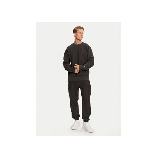 Champion Spodnie dresowe 218645 Czarny Regular Fit Champion M MODIVO