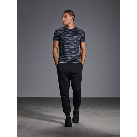 Sinsay - Spodnie tapered fit - czarny Sinsay L Sinsay