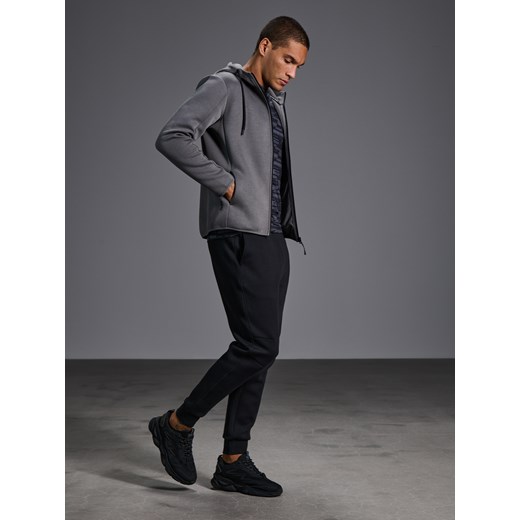 Sinsay - Spodnie tapered fit - czarny Sinsay L Sinsay
