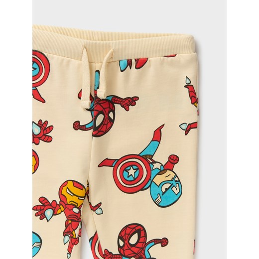 Sinsay - Spodnie dresowe Marvel - kremowy Sinsay 74 Sinsay
