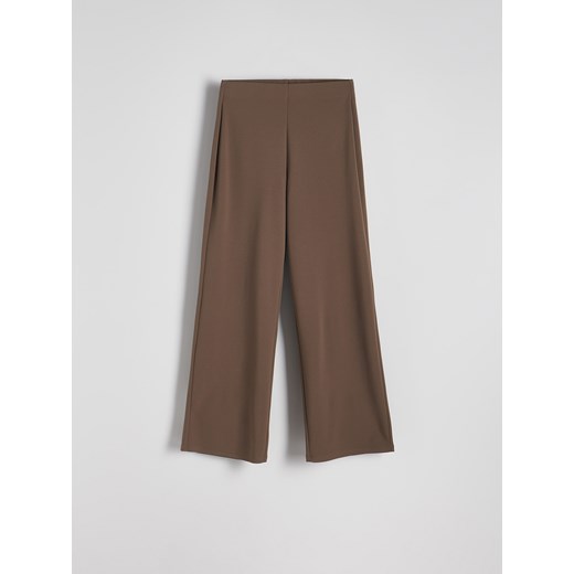 Reserved - Spodnie z szerokimi nogawkami - brązowy Reserved L Reserved