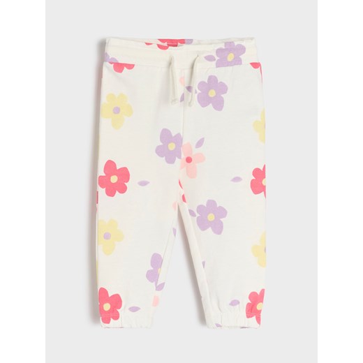 Sinsay - Spodnie dresowe z motywem kwiatów - kremowy Sinsay 86 Sinsay