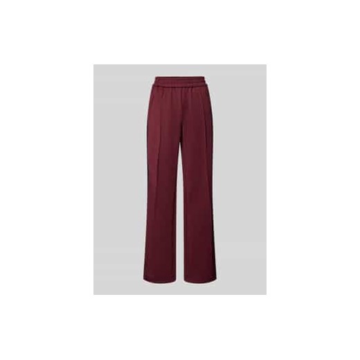 Spodnie typu track pants o luźnym kroju z paskami w kontrastowym kolorze model ‘WARM UP X’ ze sklepu Peek&Cloppenburg  w kategorii Spodnie damskie - zdjęcie 177808047