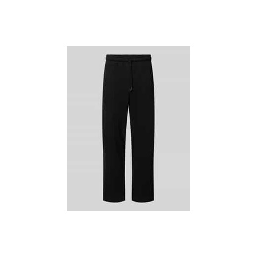 Spodnie dresowe o kroju regular fit z elastycznym pasem model ‘TORTOLI’ ze sklepu Peek&Cloppenburg  w kategorii Spodnie męskie - zdjęcie 177820048