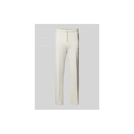 Spodnie typu track pants z elastycznym pasem i wyhaftowanym logo ze sklepu Peek&Cloppenburg  w kategorii Spodnie męskie - zdjęcie 177828866