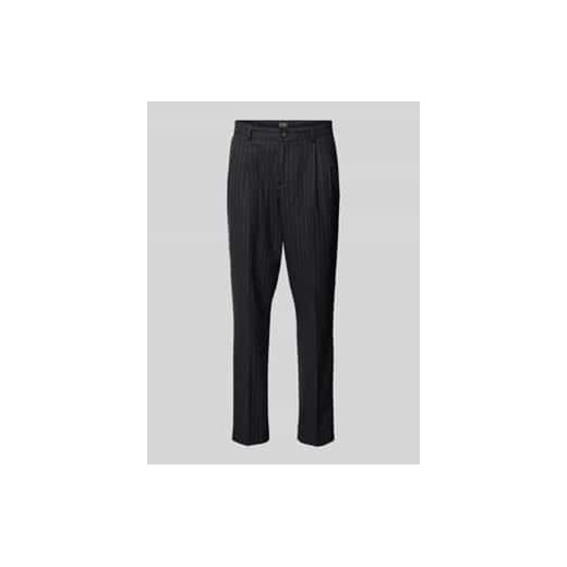 Spodnie o kroju slim fit z zakładkami w pasie ze sklepu Peek&Cloppenburg  w kategorii Spodnie męskie - zdjęcie 177832817