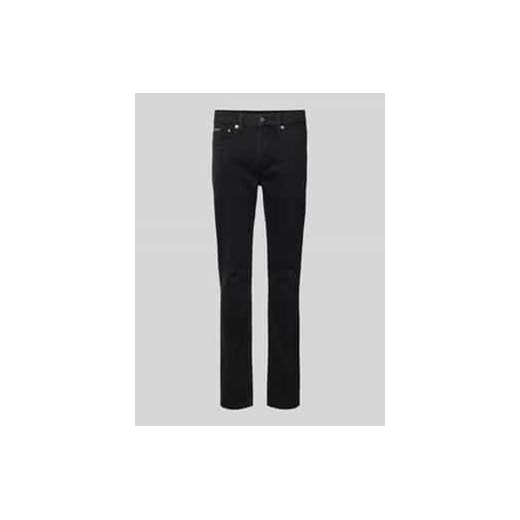 Jeansy o kroju slim fit z detalem z logo ze sklepu Peek&Cloppenburg  w kategorii Jeansy męskie - zdjęcie 177833337