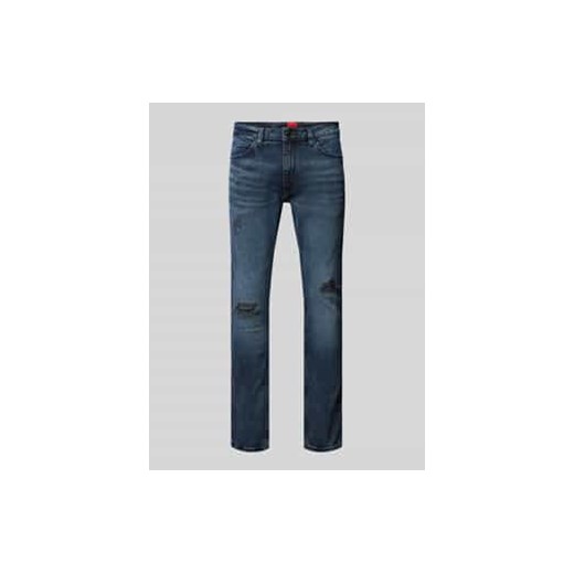 Jeansy o kroju slim fit z przetarciami model ‘HUGO 734’ ze sklepu Peek&Cloppenburg  w kategorii Jeansy męskie - zdjęcie 177856726