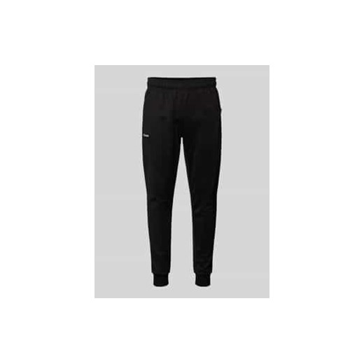 Spodnie typu track pants o kroju tapered fit z naszywkami z logo model ‘BERTONI’ ze sklepu Peek&Cloppenburg  w kategorii Spodnie męskie - zdjęcie 177857325