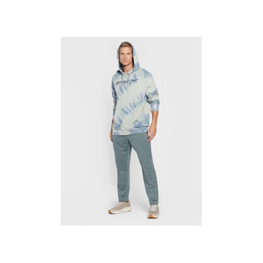 Skechers Spodnie dresowe Ultra Go M1PT77 Niebieski Tapered Fit Skechers S MODIVO