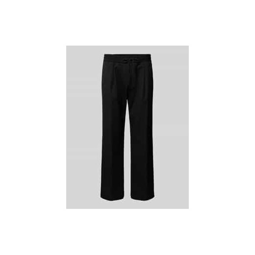 Spodnie o kroju baggy fit z elastycznym pasem model ‘Ravi’ ze sklepu Peek&Cloppenburg  w kategorii Spodnie męskie - zdjęcie 177953609