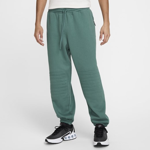 Męskie zimowe spodnie piłkarskie Nike Therma-FIT Liverpool F.C. Tech Pack - Nike L Nike poland