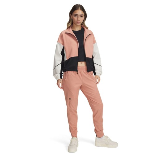 Damskie spodnie treningowe joggery Under Armour UA Unstoppable Jogger - różowe ze sklepu Sportstylestory.com w kategorii Spodnie damskie - zdjęcie 178032867