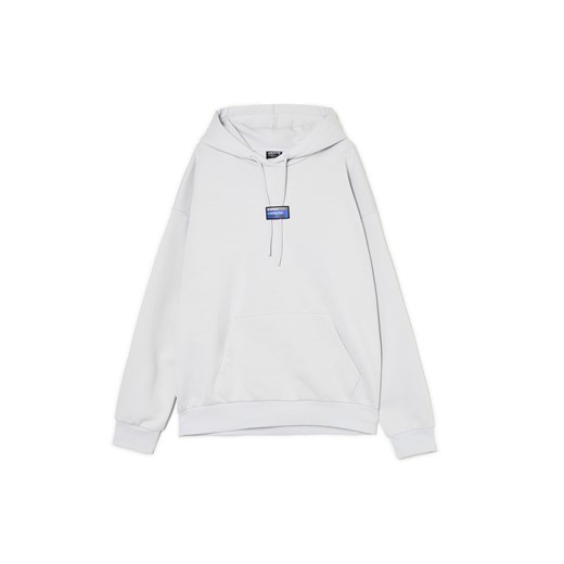 Cropp - Bluza hoodie z aplikacją i nadrukiem - niebieski ze sklepu Cropp w kategorii Bluzy męskie - zdjęcie 178033479