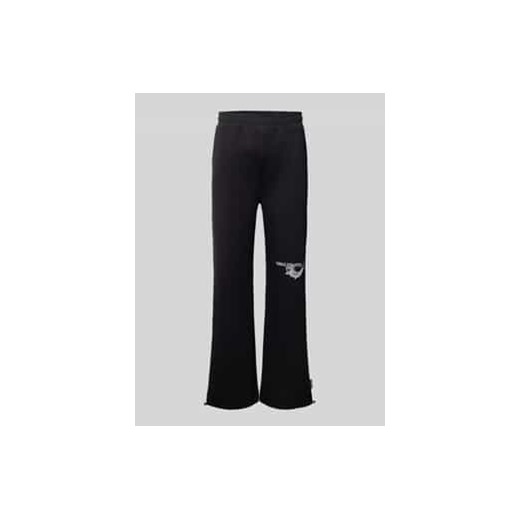 Spodnie dresowe o kroju oversized fit z nadrukiem z logo ze sklepu Peek&Cloppenburg  w kategorii Spodnie męskie - zdjęcie 178089088