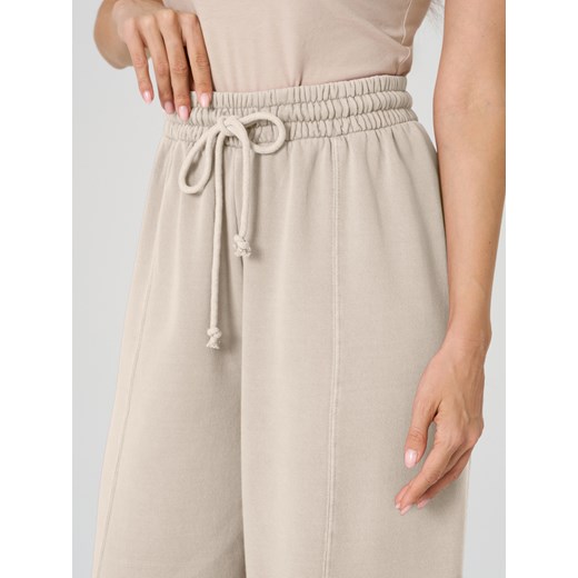 Sinsay - Spodnie dresowe z szerokimi nogawkami - kremowy Sinsay XS Sinsay