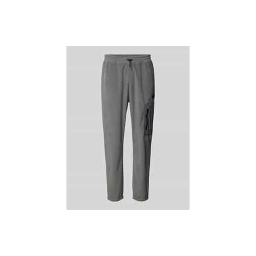 Spodnie dresowe o kroju relaxed fit z naszywką z logo ze sklepu Peek&Cloppenburg  w kategorii Spodnie męskie - zdjęcie 178120247