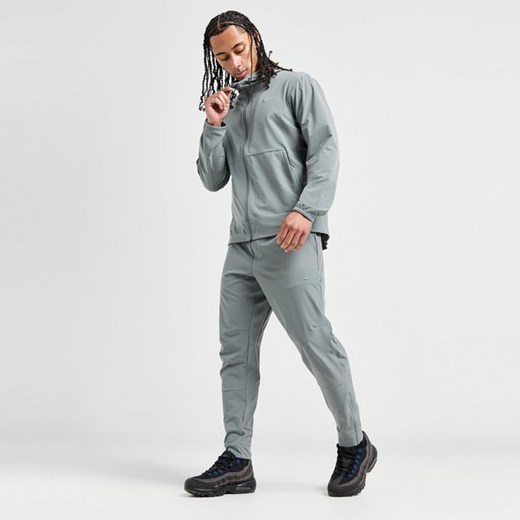NIKE SPODNIE M NK DF UNLIMITED PANT TPR ze sklepu JD Sports  w kategorii Spodnie męskie - zdjęcie 178189709