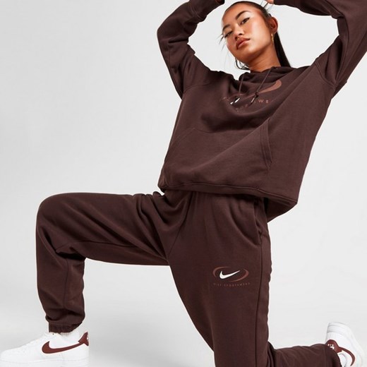 NIKE SPODNIE NSW PHNX FLC HR OS PANT PRNT ze sklepu JD Sports  w kategorii Spodnie damskie - zdjęcie 178189935