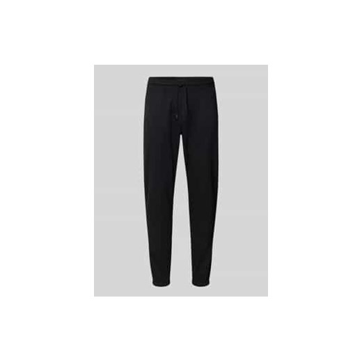 Spodnie dresowe o kroju slim fit z zaznaczonym rozporkiem ze sklepu Peek&Cloppenburg  w kategorii Spodnie męskie - zdjęcie 178206987