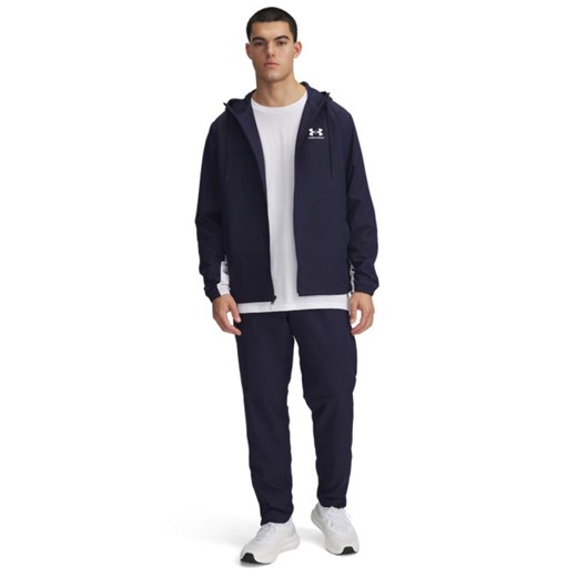 Męskie spodnie casual tkaninowe Under Armour UA Rival Woven Windbreaker Pant - granatowe ze sklepu Sportstylestory.com w kategorii Spodnie męskie - zdjęcie 178209496