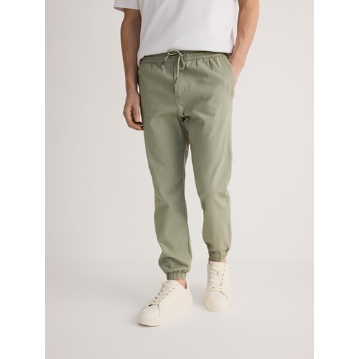 Spodnie męskie zielone Reserved 