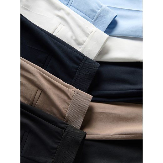 Reserved - Spodnie slim z kantem - brązowy Reserved 38 Reserved