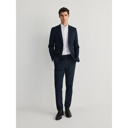 Reserved - Spodnie slim fit z kantem - granatowy ze sklepu Reserved w kategorii Spodnie męskie - zdjęcie 178323766