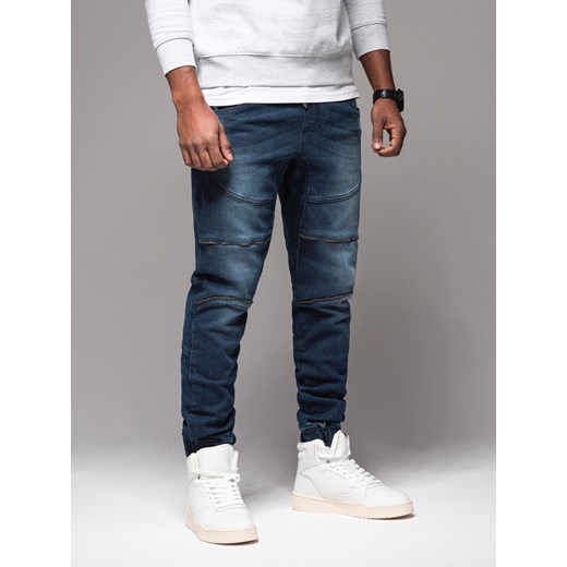 Męskie spodnie jeansowe joggery z przetarciami i zamkami – ciemnoniebieskie V1  OM-PADJ-0243 ze sklepu ombre w kategorii Jeansy męskie - zdjęcie 178432785