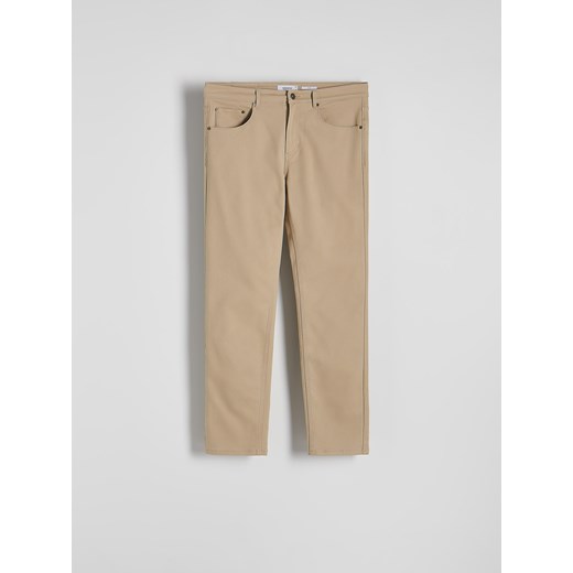 Reserved - Bawełniane spodnie slim fit - beżowy Reserved L Reserved