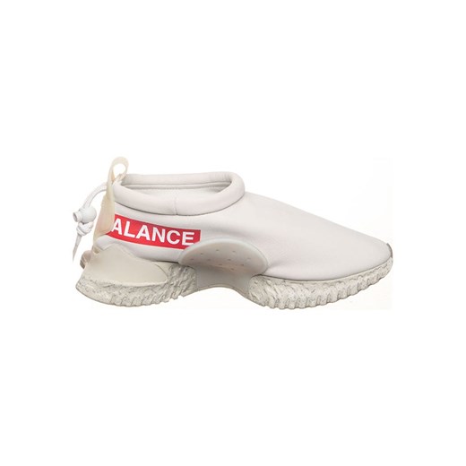 Nike Skórzane slippersy &quot;X Undercover Moc Flow&quot; w kolorze kremowym Nike 42,5 okazja Limango Polska