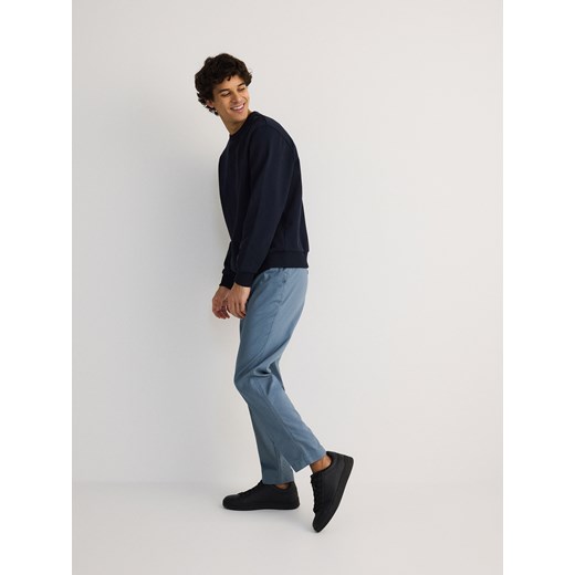 Reserved - Spodnie chino slim fit - granatowy ze sklepu Reserved w kategorii Spodnie męskie - zdjęcie 178570407