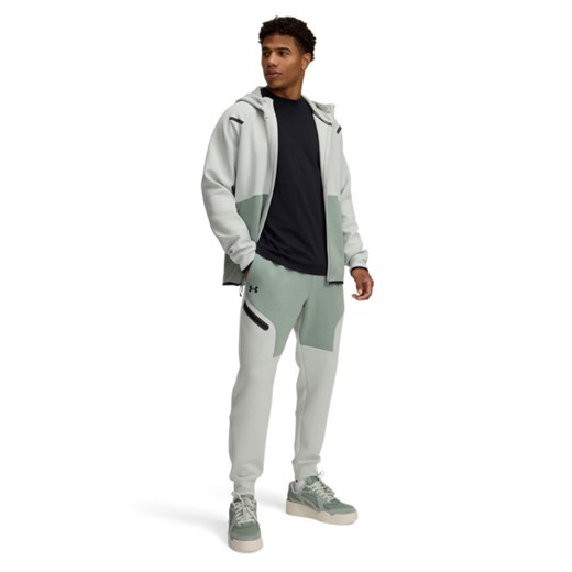 Męskie spodnie treningowe Under Armour UA Unstoppable Flc Jgr Eu - zielone ze sklepu Sportstylestory.com w kategorii Spodnie męskie - zdjęcie 178599069