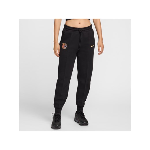 Damskie joggery piłkarskie ze średnim stanem Nike FC Barcelona Tech Fleece - Czerń ze sklepu Nike poland w kategorii Spodnie damskie - zdjęcie 178605435