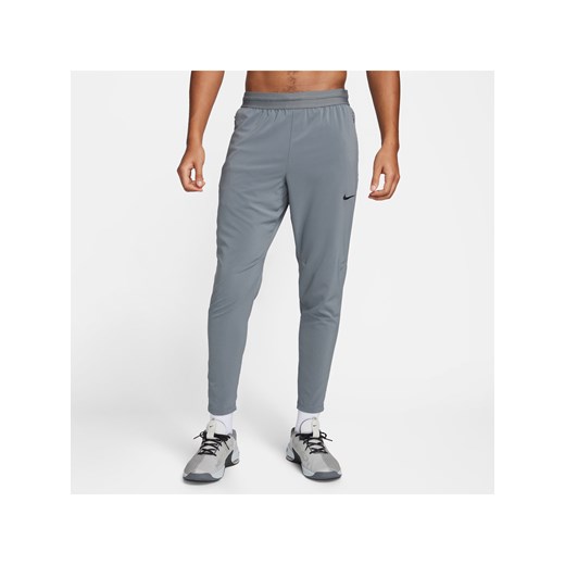 Męskie spodnie do fitnessu Dri-FIT Nike Flex Rep - Szary ze sklepu Nike poland w kategorii Spodnie męskie - zdjęcie 178605699