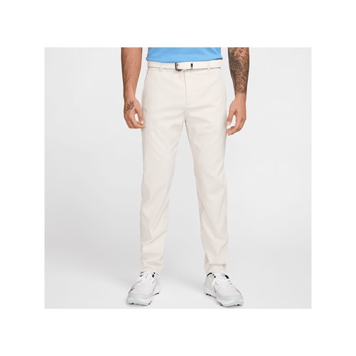 Męskie chinosy o dopasowanym kroju do golfa Nike Tour Repel - Brązowy ze sklepu Nike poland w kategorii Spodnie męskie - zdjęcie 178606807