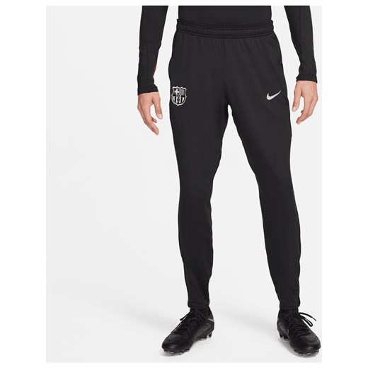 Męskie spodnie piłkarskie z dzianiny Nike Dri-FIT FC Barcelona Strike - Czerń ze sklepu Nike poland w kategorii Spodnie męskie - zdjęcie 178608155