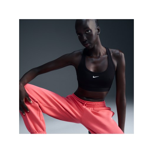 Damski stanik sportowy z miękkimi miseczkami Nike Swoosh Light Support - Czerń ze sklepu Nike poland w kategorii Biustonosze - zdjęcie 178608218