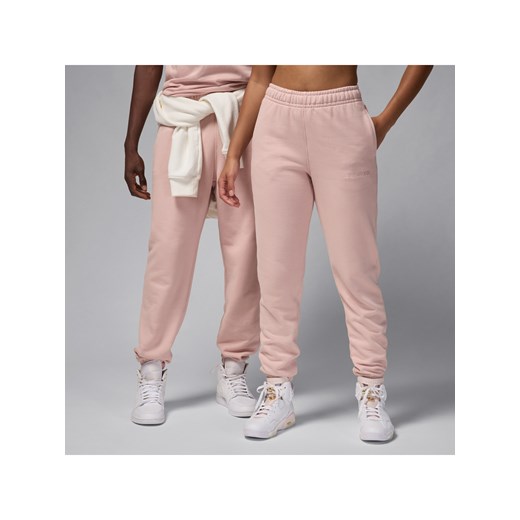 Męskie spodnie z dzianiny Air Jordan Wordmark - Różowy ze sklepu Nike poland w kategorii Spodnie męskie - zdjęcie 178608255