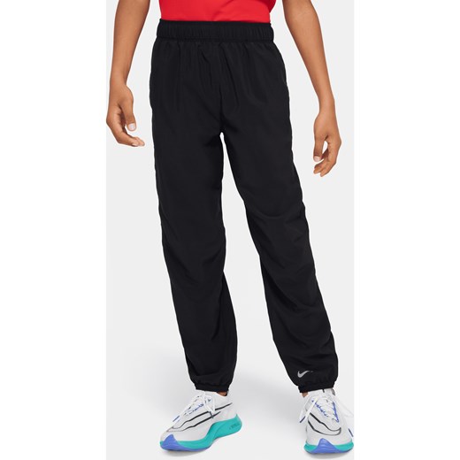 Spodnie dla dużych dzieci (chłopców) Nike Dri-FIT Multi - Czerń ze sklepu Nike poland w kategorii Spodnie chłopięce - zdjęcie 178608409