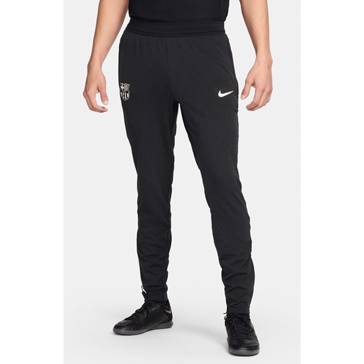 Męskie spodnie piłkarskie z dzianiny Nike Dri-FIT ADV FC Barcelona Strike Elite - Czerń ze sklepu Nike poland w kategorii Spodnie męskie - zdjęcie 178609116