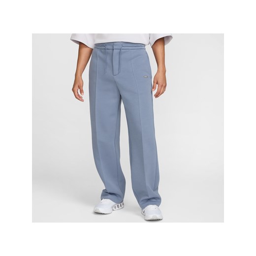 Męskie dopasowane spodnie piłkarskie Nike Inter Mediolan Tech Fleece (wersja wyjazdowa) - Niebieski ze sklepu Nike poland w kategorii Spodnie męskie - zdjęcie 178609589